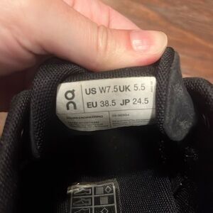 On Cloud tennis shoes.